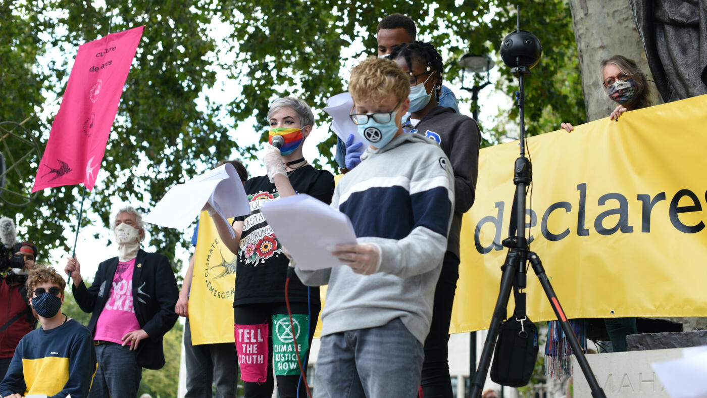 speakers at a demonstration