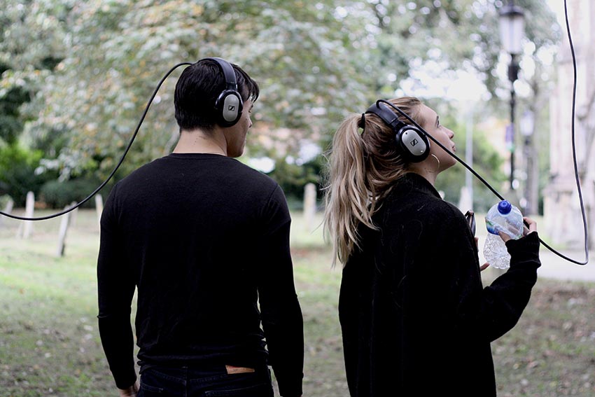 audience outdoors with headphones